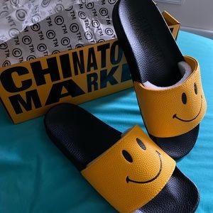 Size 12 never worn China town market smiley slides
